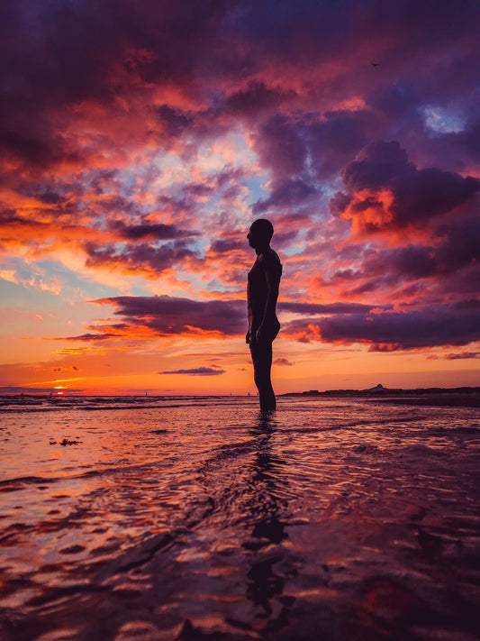 Antony Gormley's Iron Men Sunset
