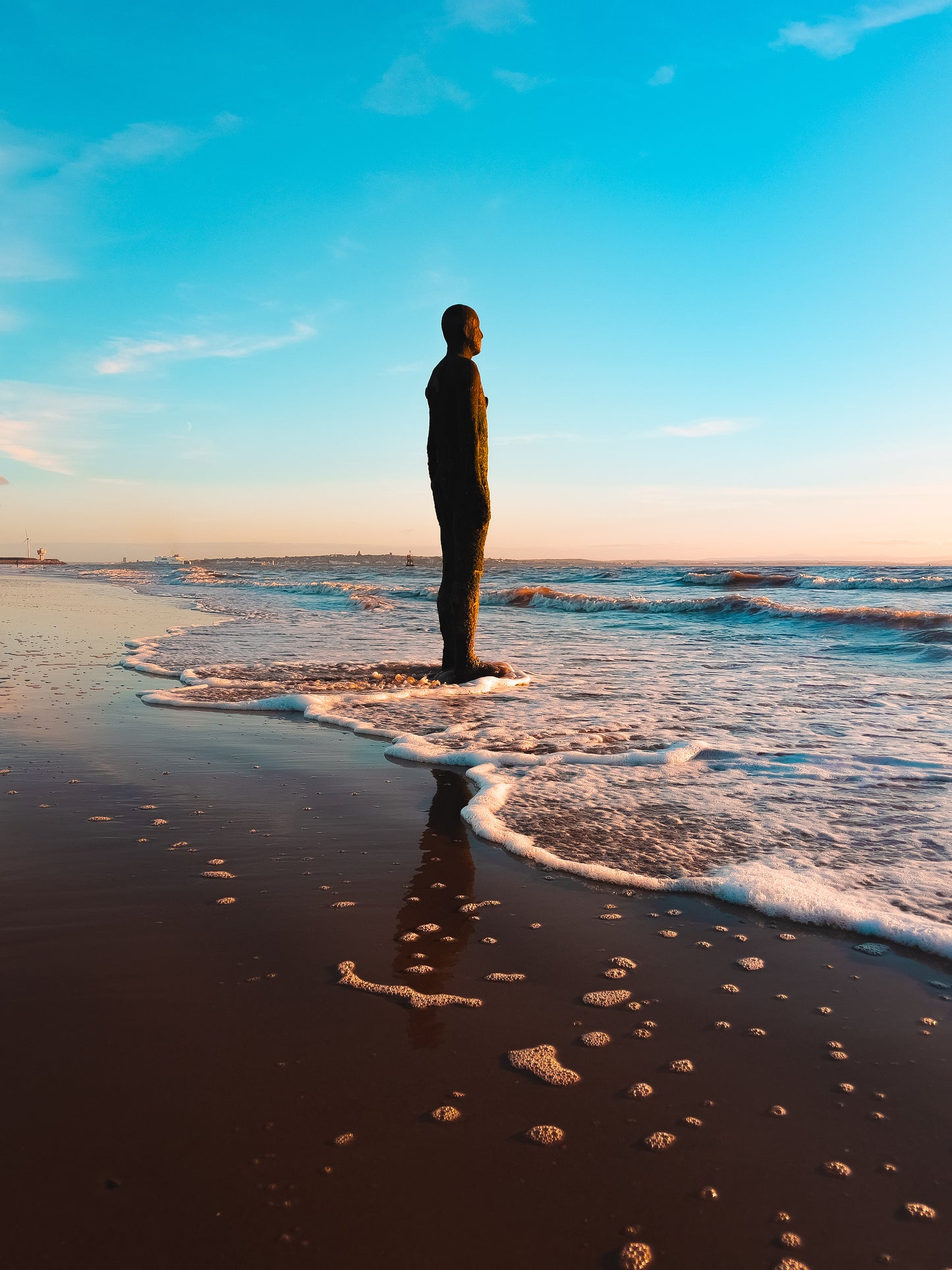 Antony Gormley's Iron Men Sunset