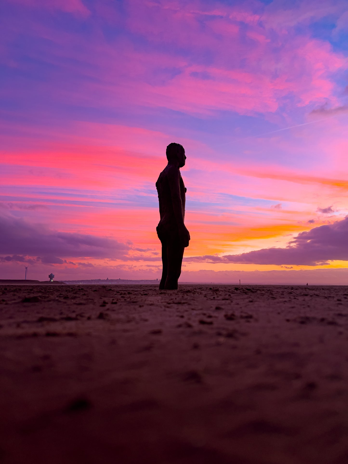 Antony Gormley's Iron Men Sunset